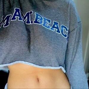 Selling a cropped long sleeve. grey